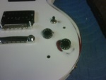 White Painted Guitar After Close-Up